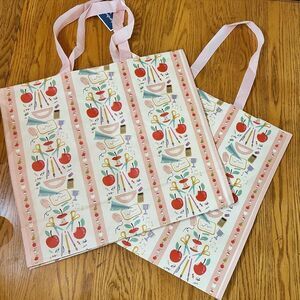 Colorful reusable tote bags with school teacher design
